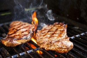 Steaks on barbecue
